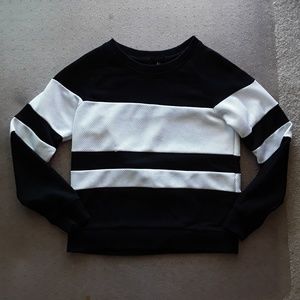 Jersey and waffle-knit sweater